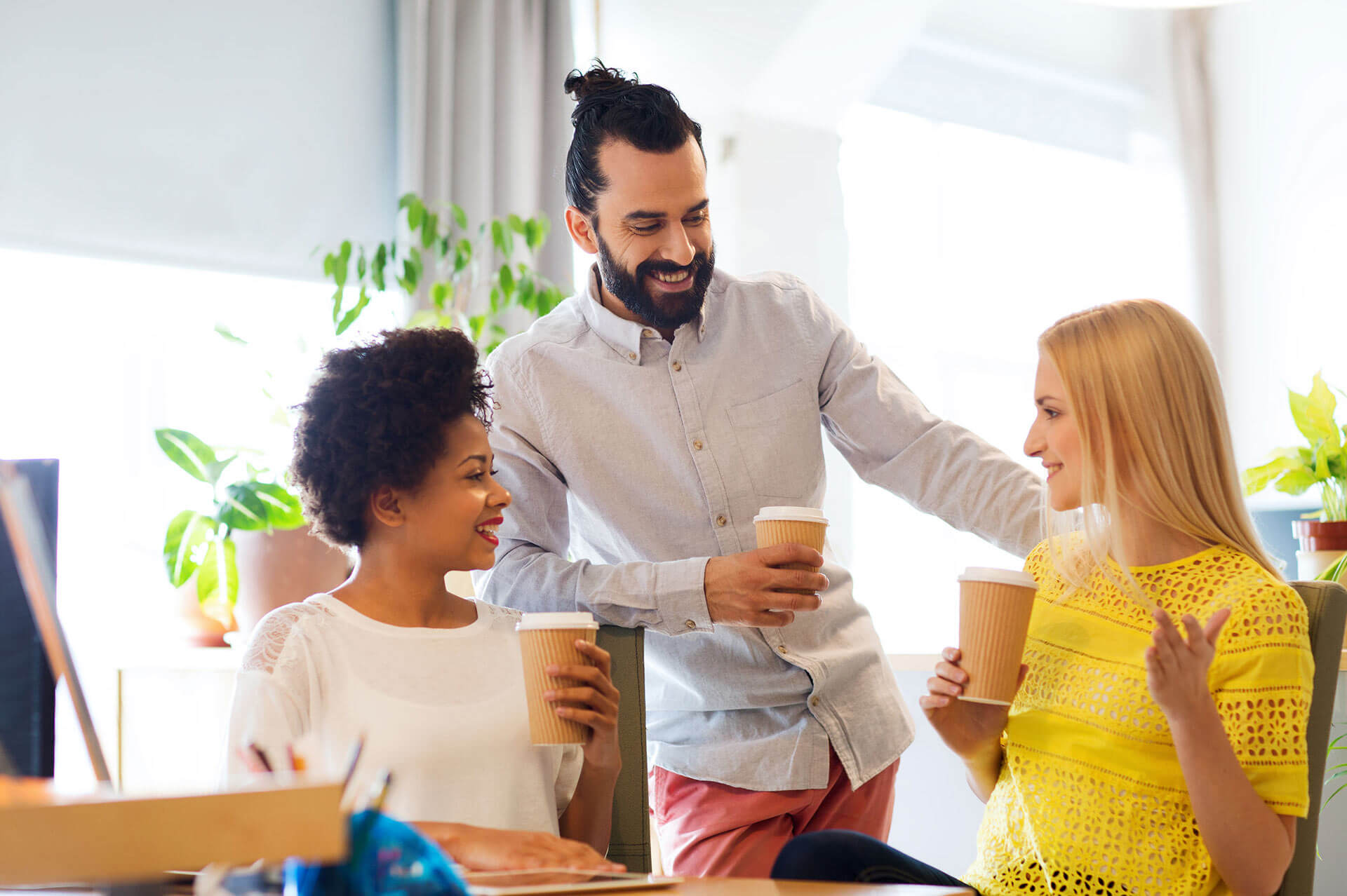 A group of people that are drinking coffee.